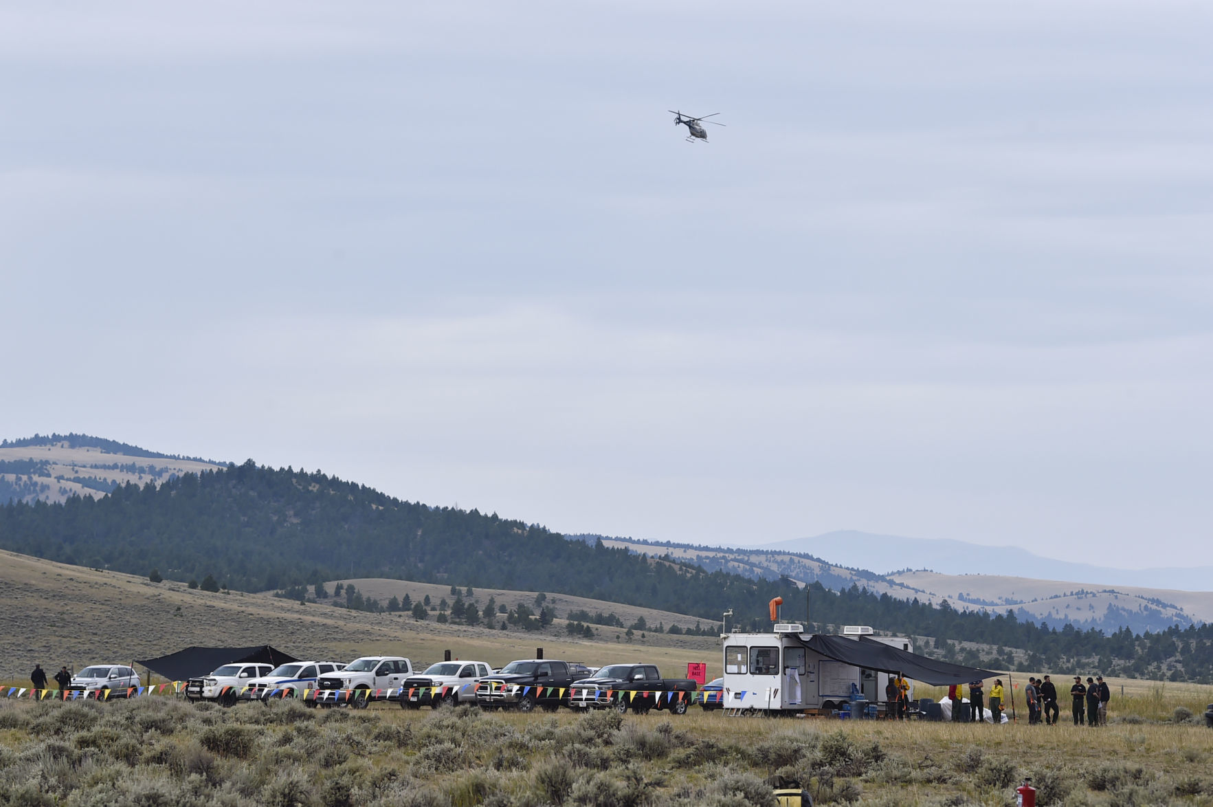A helicopter flie over the helicopter base